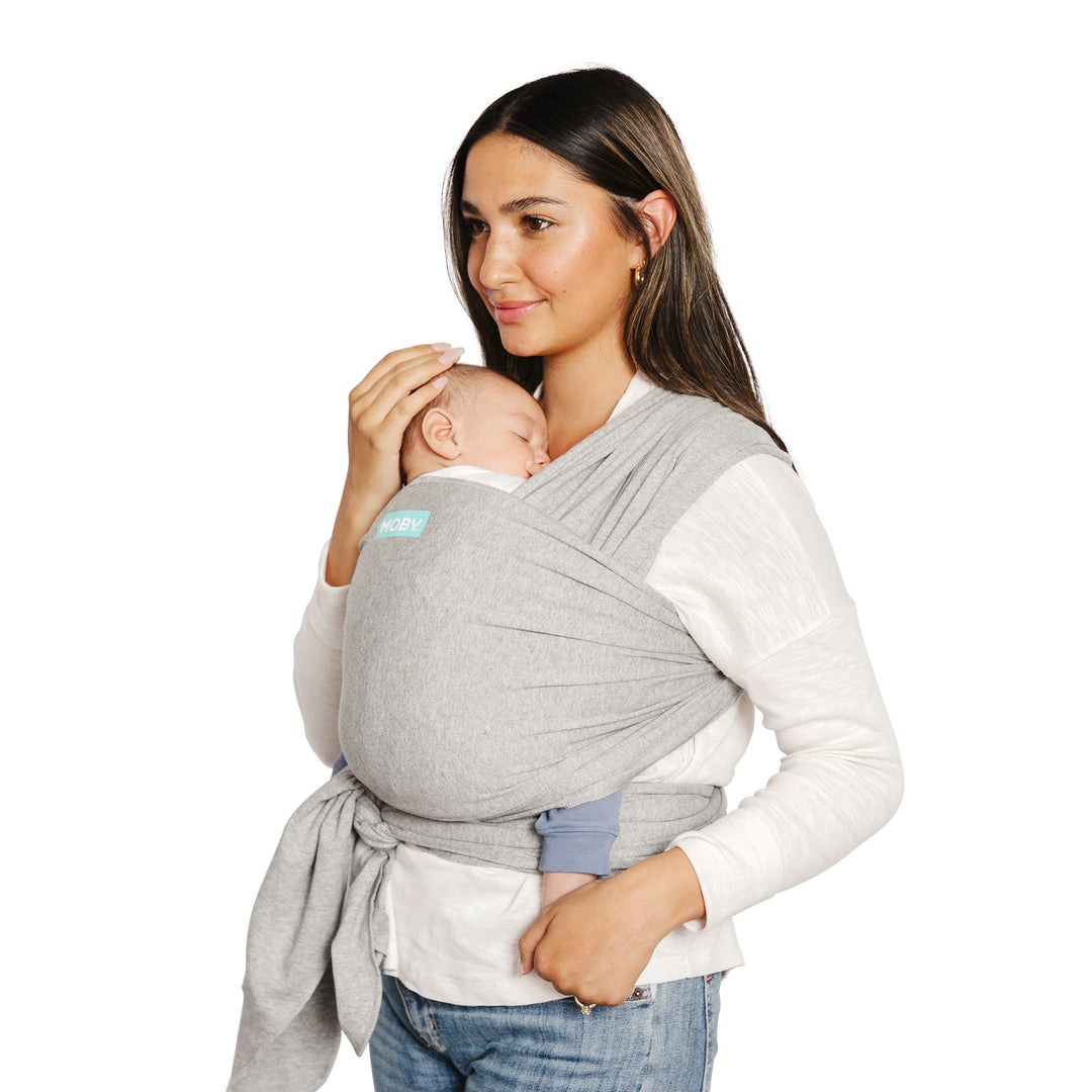 mom wearing baby in moby classic wrap in gray