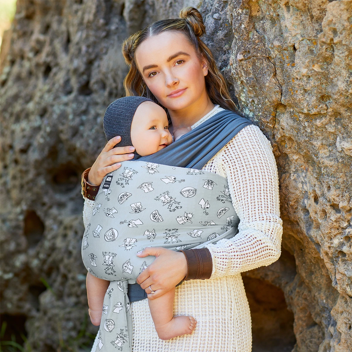 Mom wearing baby in Easy-Wrap Carrier in Grogu’s Galaxy