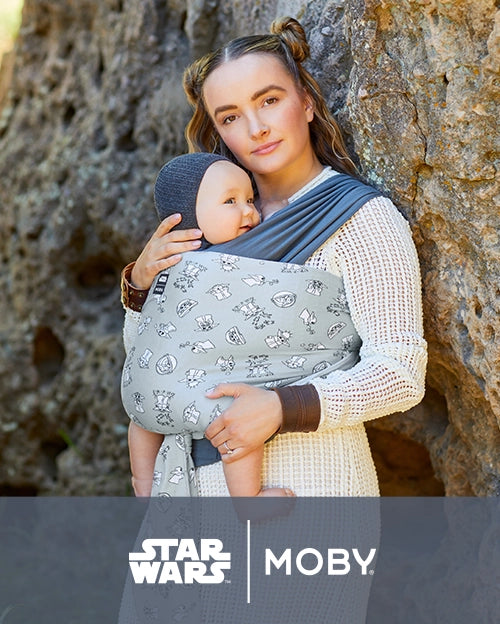 mom wearing baby in easy wrap in grogu's galaxy