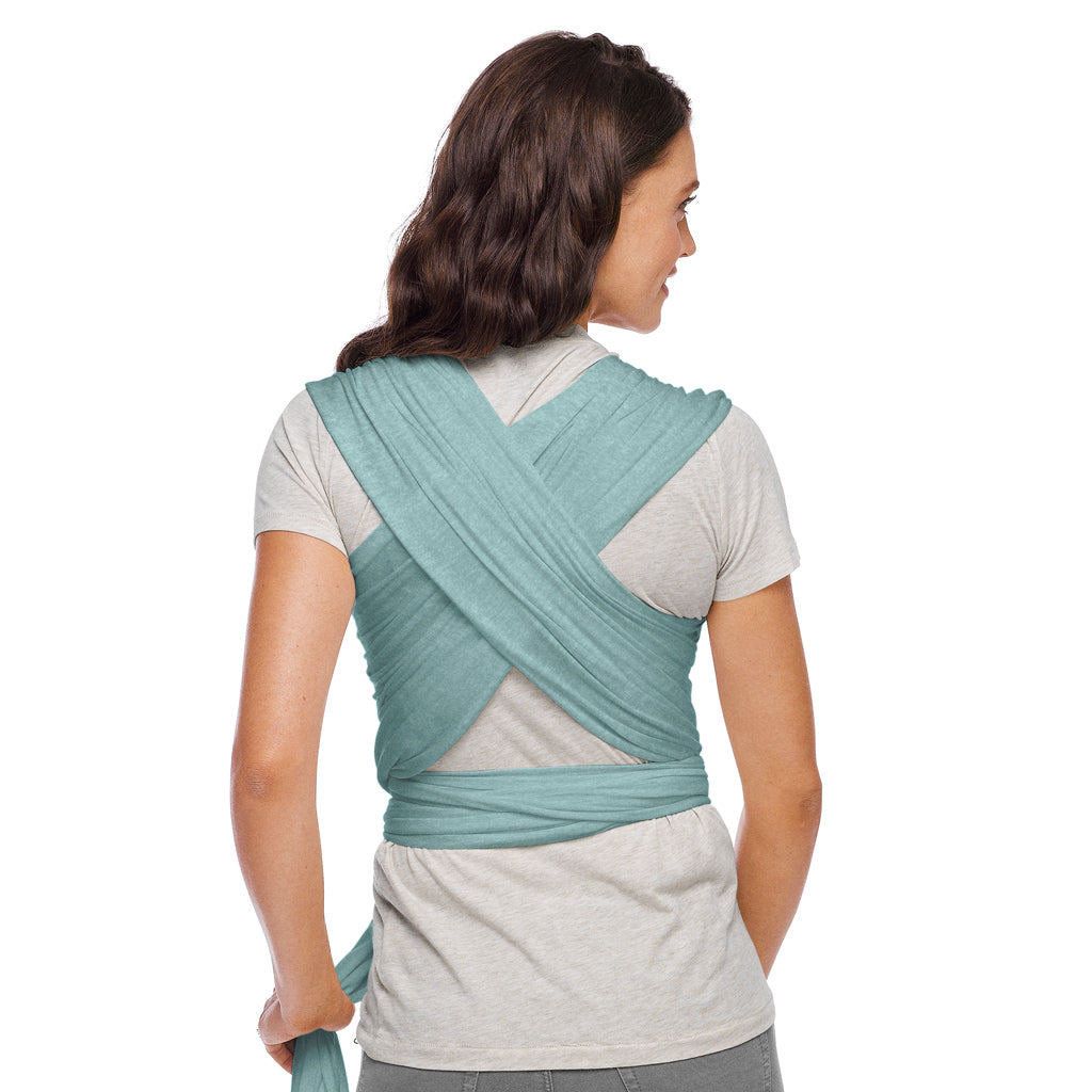 back image of mom wearing baby in elements wrap in hydro