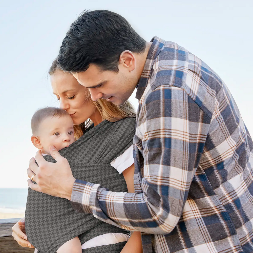 mom wearing baby in Classic Wrap Baby Carrier by Petunia Pickle Bottom in Houndstooth