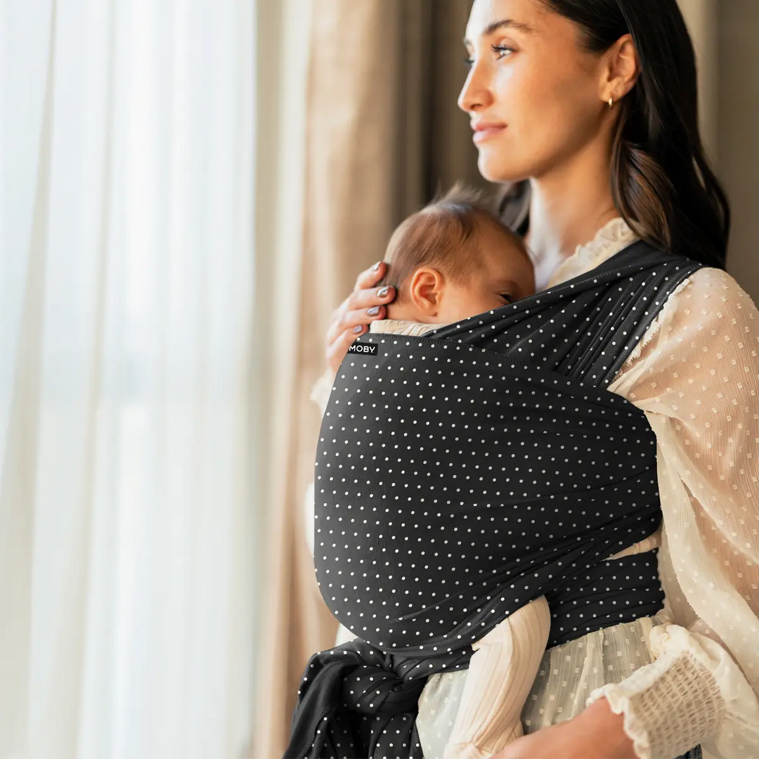 mom wearing baby in Classic Wrap Baby Carrier in Midnight Speckle