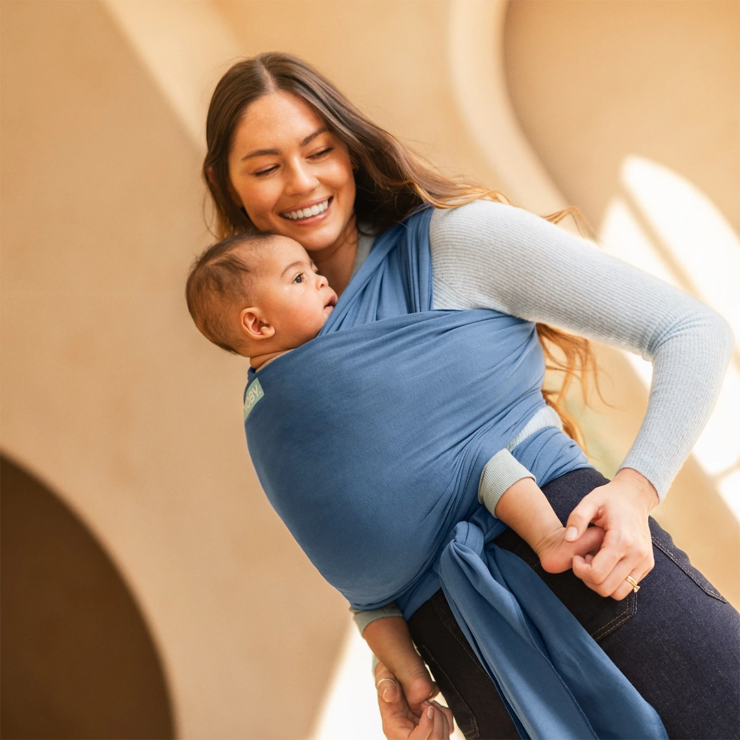 mom wearing baby in Classic Wrap Baby Carrier in Ocean