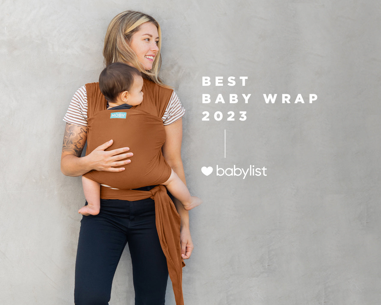 best baby wrap 2023 babylist. mom wearing baby in moby evolution wrap in caramel.