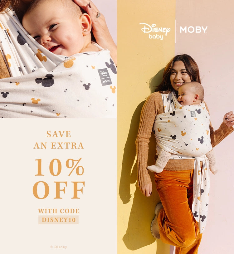 disney baby by moby. save an extra 10% off with code disney10. mom wearing baby in disney wrap