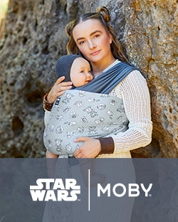 mom wearing baby in easy wrap in grogu's galaxy