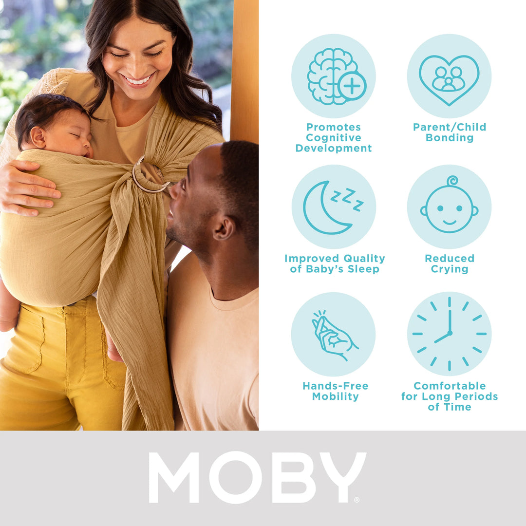 mom wearing baby in moby ring sling. promotes cognitive development, parent/child bonding, improved quality of baby's sleep, reduced crying, hands-free mobility, comfortable for long periods of time.