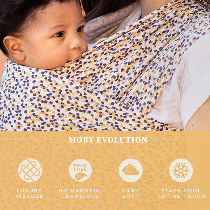 moby wrap evolution in hopscotch is luxury viscose, no harmful chemicals and pfas free, silky soft, and stays cool to the touch