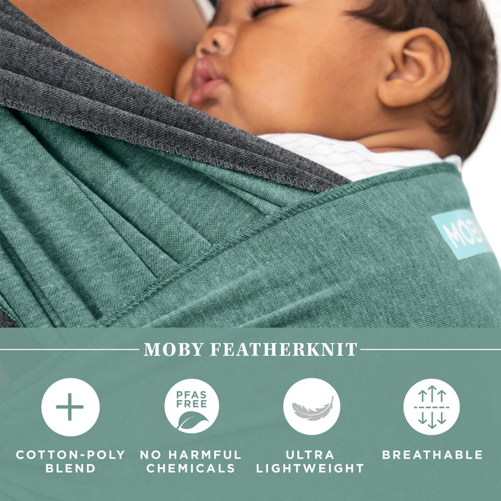 mom wearing baby in Reversible wrap in jade grey. cotton poly blend. pfas free no harmful chemicals. ultra light weight. breathable