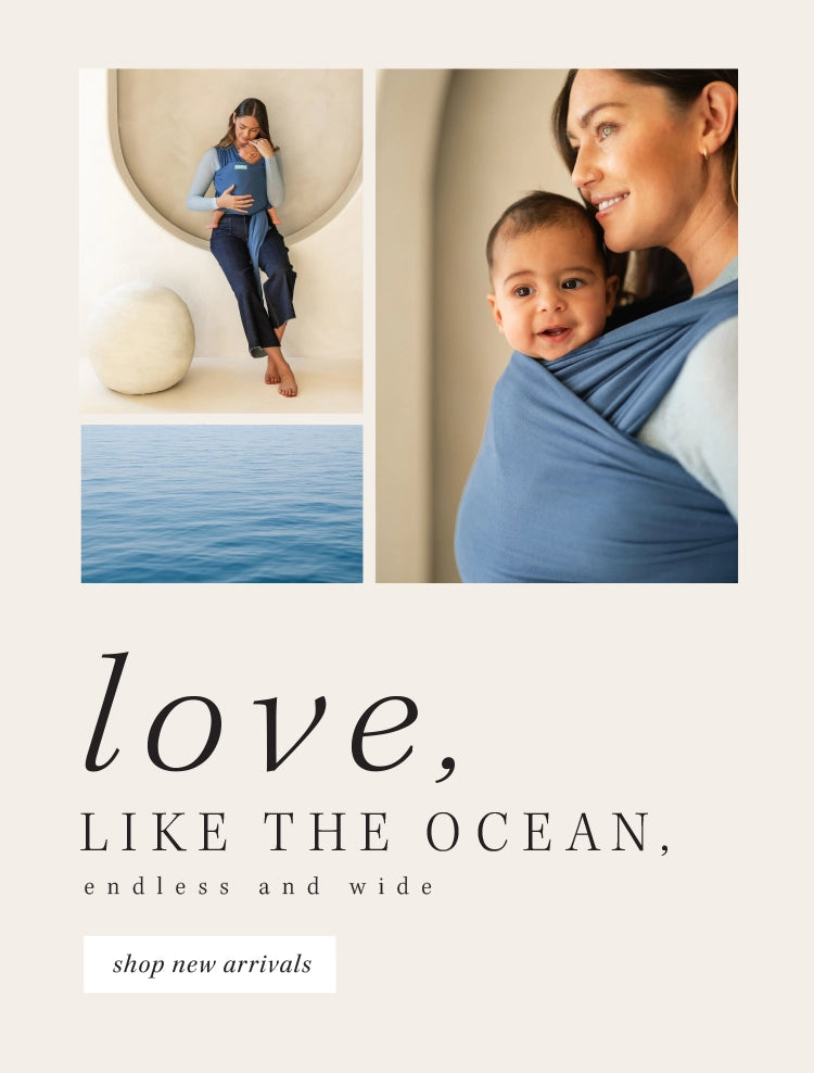 love like the ocean endless and wide. shop new arrivals. mom wearing baby in classic wrap in ocean