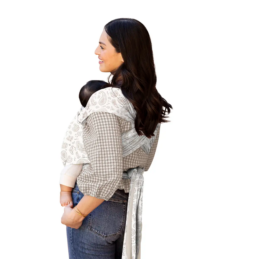 Mom wearing baby in Classic Wrap Baby Carrier in Bandana