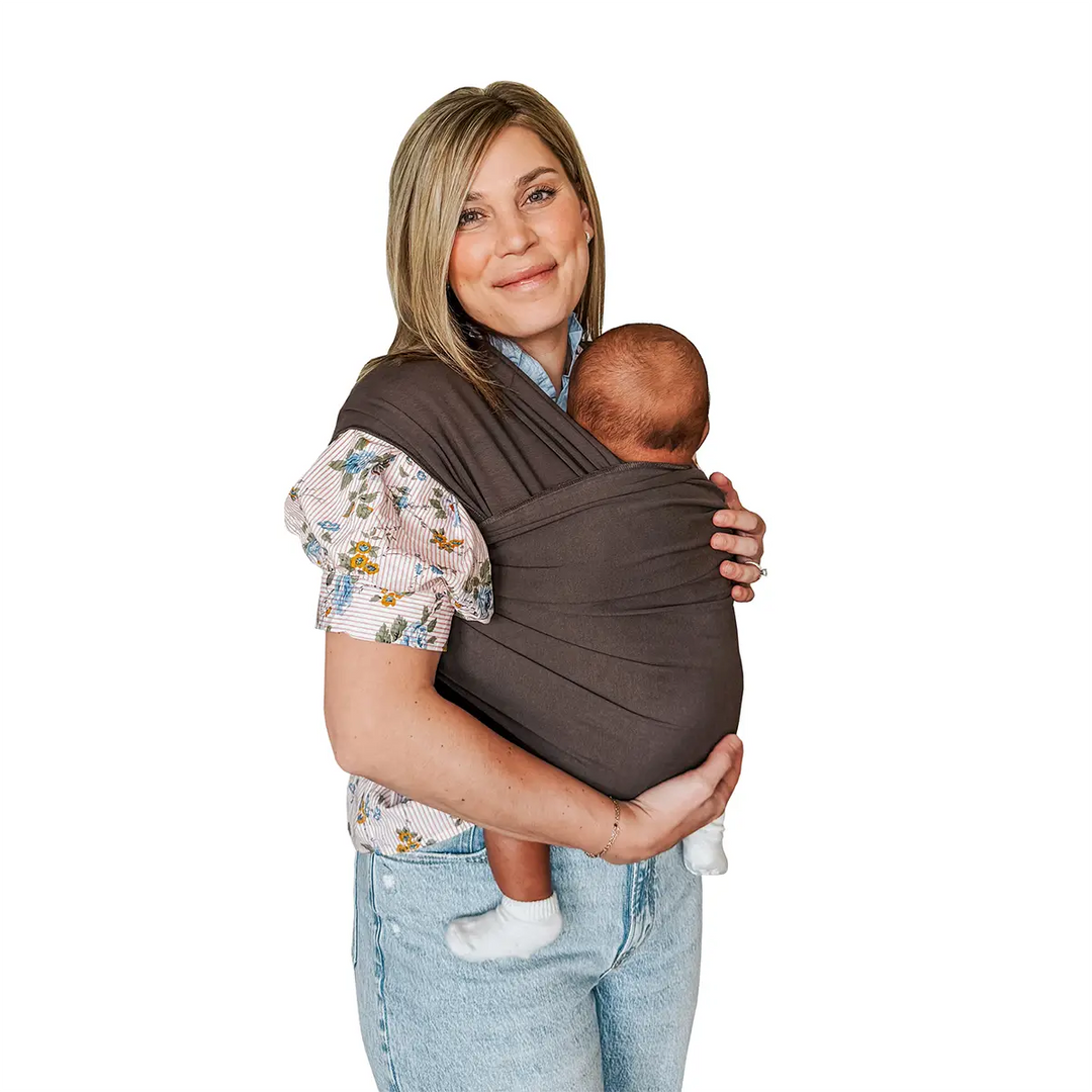 mom wearing baby in Classic Wrap Baby Carrier in Hickory