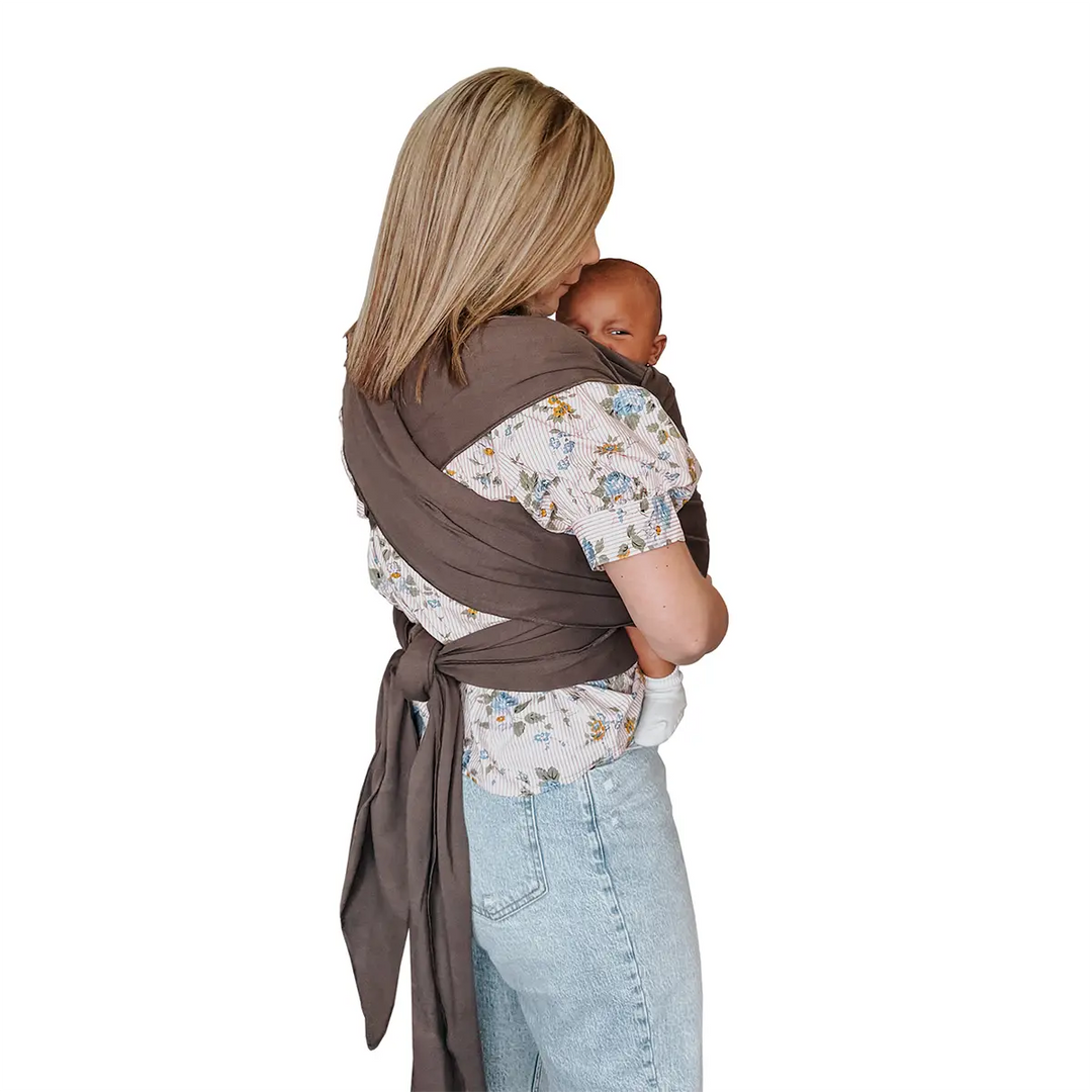 mom wearing baby in Classic Wrap Baby Carrier in Hickory