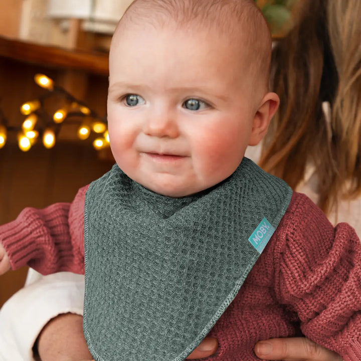 baby wearing waffle knit bib