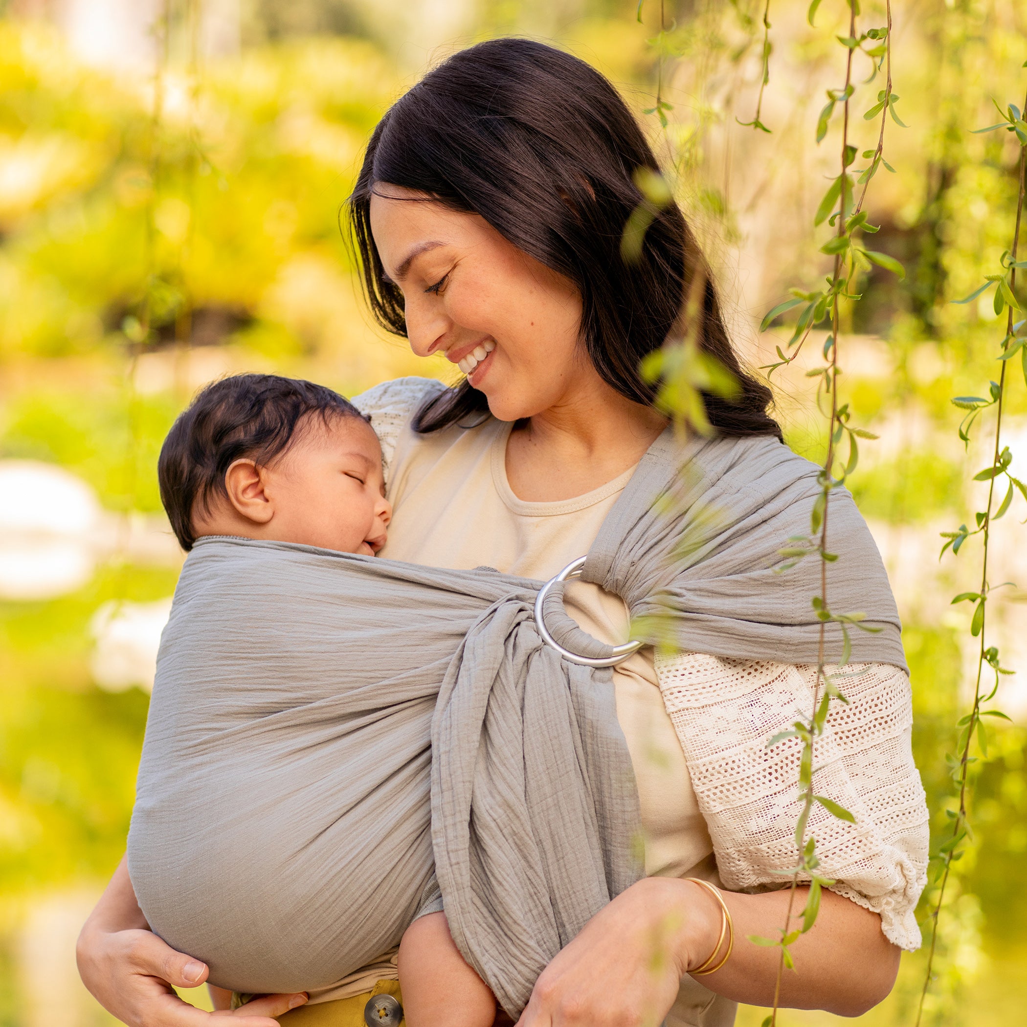 mom wearing baby in ring sling in pewter