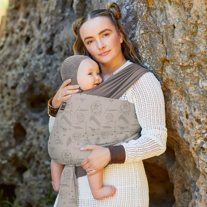 mom wearing baby in Easy-Wrap Carrier in Raising Rebels