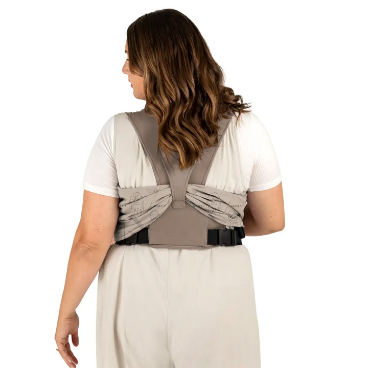 back image of mom wearing baby in Easy-Wrap Carrier in Raising Rebels